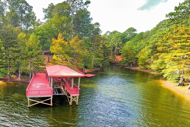 view of dock with a water view