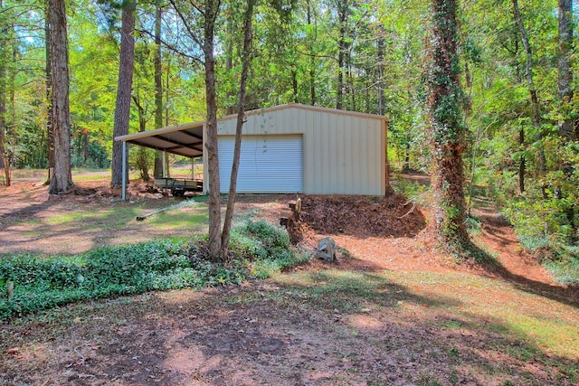 view of outdoor structure with a garage