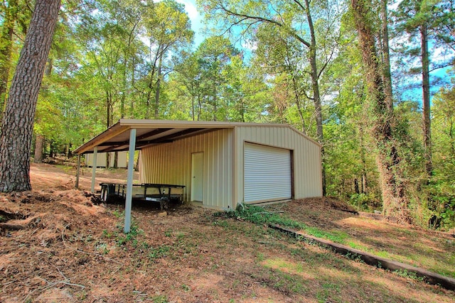 view of outbuilding with a garage