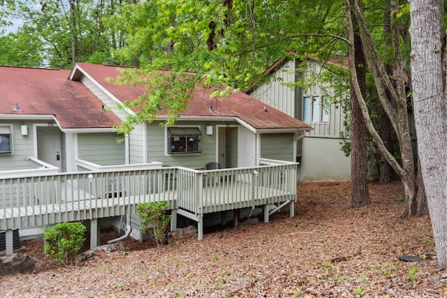 rear view of house with a deck