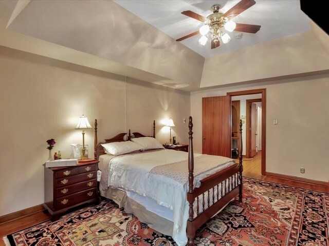 bedroom with ceiling fan and wood-type flooring