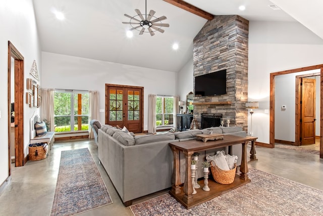 living room with french doors, ceiling fan, beam ceiling, high vaulted ceiling, and a stone fireplace