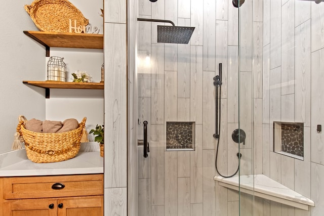 bathroom featuring an enclosed shower