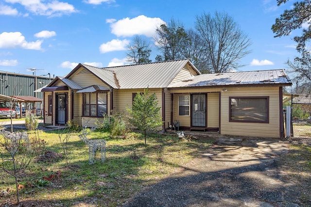 121 Hasley St, Nacogdoches, TX 75961 - view of front facade featuring metal roof