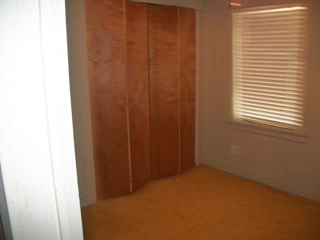 636 County Road 1165, Center, TX 75935 - unfurnished bedroom with light colored carpet