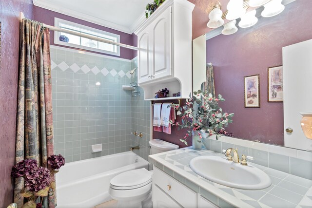 full bathroom featuring toilet, shower / tub combo with curtain, vanity, and ornamental molding