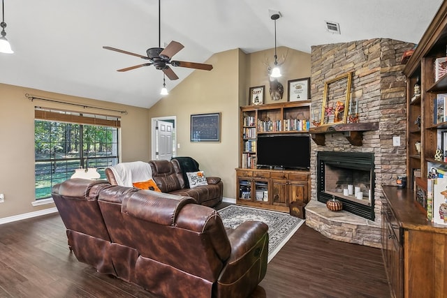 living room featuring ceiling fan, dark hardwood / wood-style flooring, high vaulted ceiling, built in features, and a fireplace