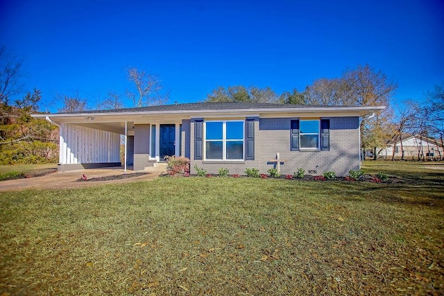 ranch-style house with brick siding, a front lawn, and a carport