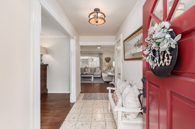 entryway with hardwood / wood-style flooring