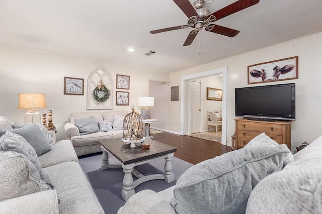 living room with ceiling fan and hardwood / wood-style flooring