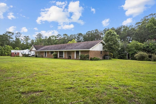 exterior space featuring a front lawn