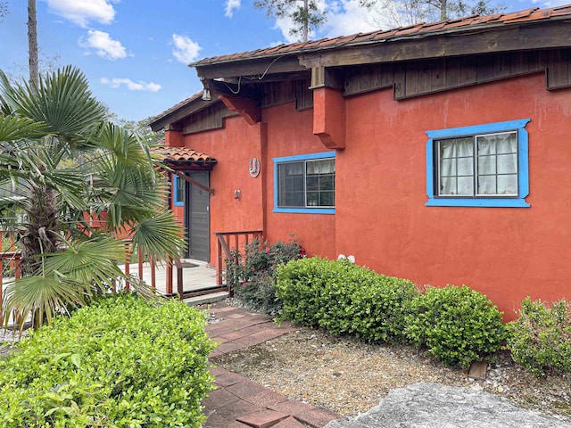 doorway to property featuring a deck