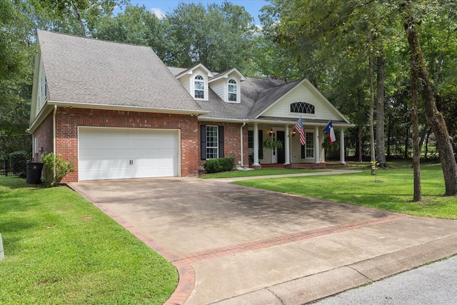 cape cod-style house with a garage, a porch, and a front lawn