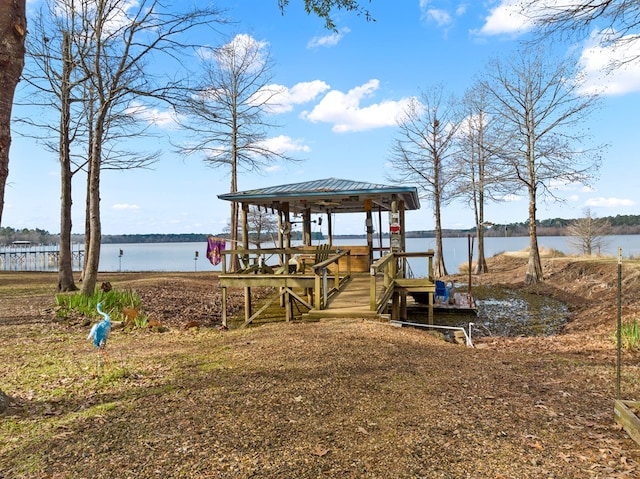 dock area featuring a water view