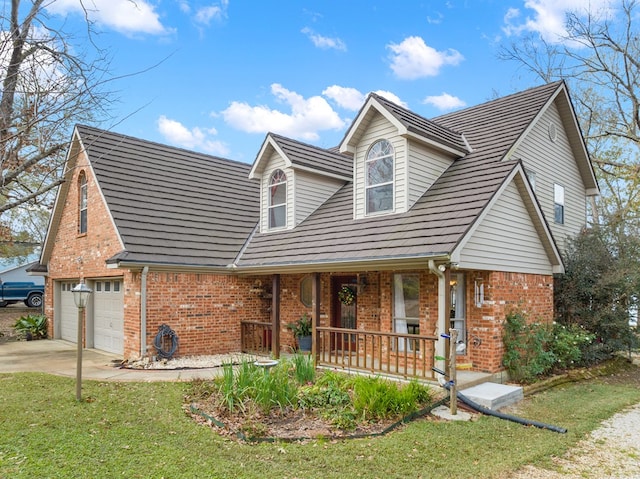 view of front facade with a front yard and a porch