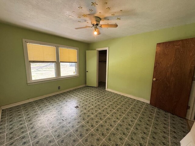 spare room featuring ceiling fan