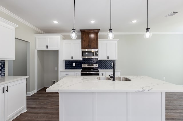 kitchen featuring visible vents, white cabinets, appliances with stainless steel finishes, ornamental molding, and a sink