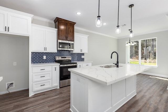 kitchen featuring dark wood-style floors, crown molding, decorative backsplash, appliances with stainless steel finishes, and a sink