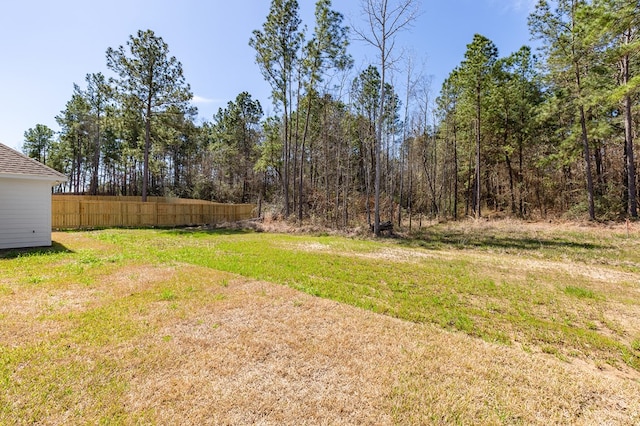 view of yard featuring fence