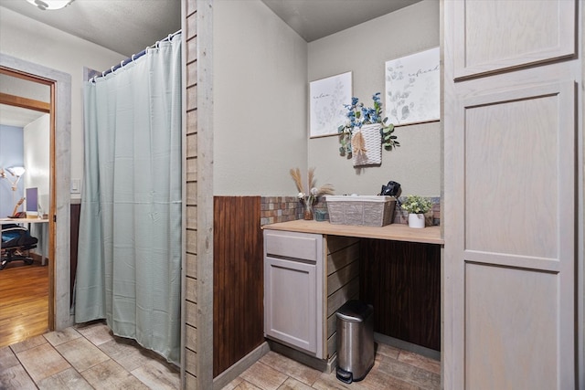 bathroom featuring hardwood / wood-style flooring