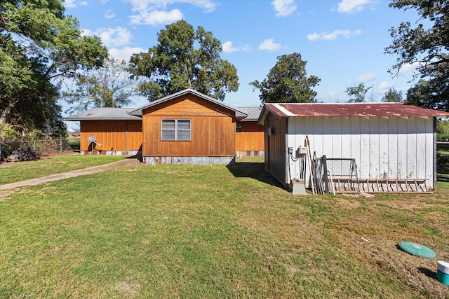 view of home's exterior featuring a lawn