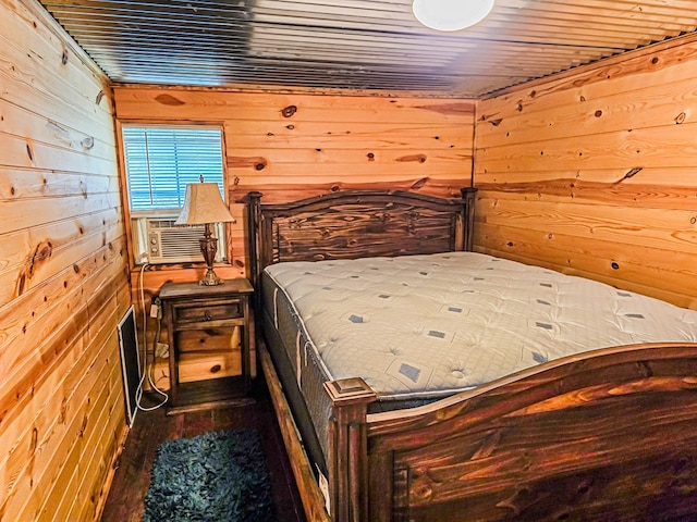 bedroom featuring wood walls, cooling unit, and wooden ceiling