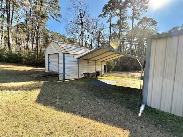 exterior space with a carport and a yard