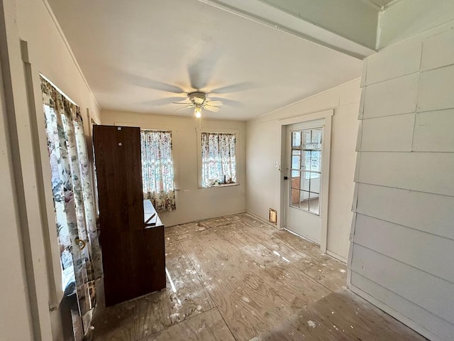 interior space featuring ceiling fan