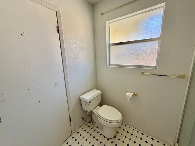bathroom featuring toilet