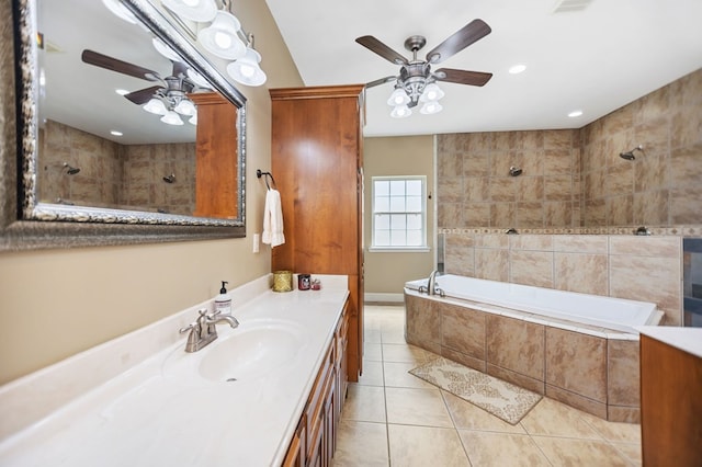full bathroom with a tile shower, tile patterned flooring, a ceiling fan, vanity, and a relaxing tiled tub