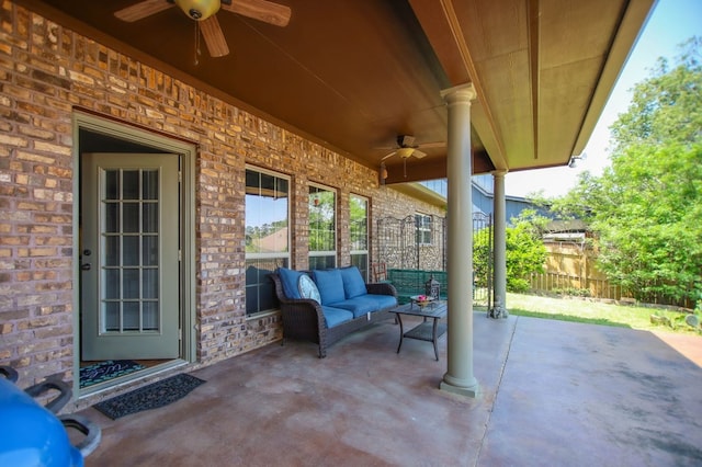 view of patio with fence, a ceiling fan, and an outdoor hangout area
