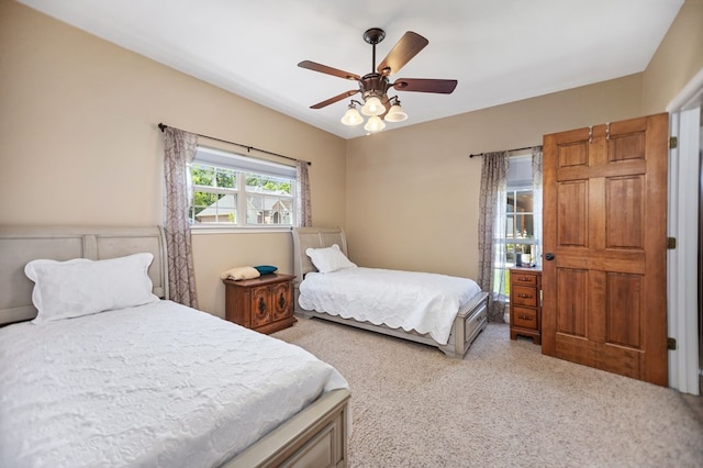 bedroom featuring carpet floors and a ceiling fan