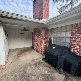 view of patio featuring ceiling fan and a grill