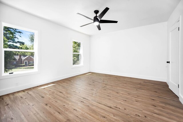 508 Jefferson Ave, Lufkin, TX 74904 - spare room with wood finished floors, baseboards, and ceiling fan