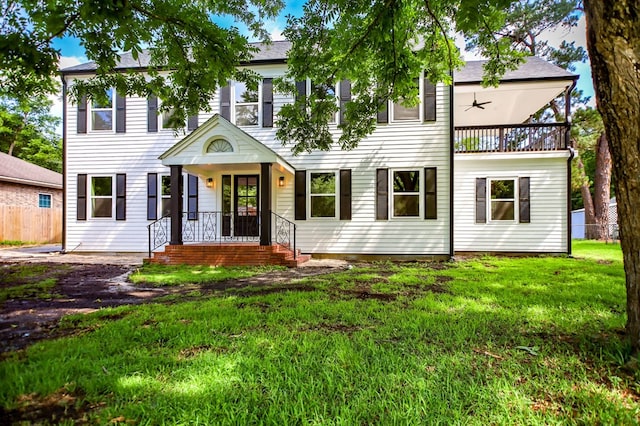 508 Jefferson Ave, Lufkin, TX 74904 - colonial-style house featuring a balcony and a ceiling fan