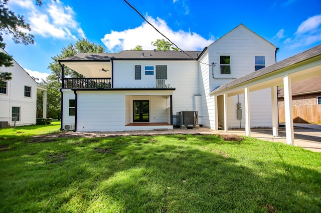 508 Jefferson Ave, Lufkin, TX 74904 - rear view of property with ceiling fan, french doors, central AC unit, a patio, and a balcony