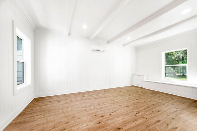 508 Jefferson Ave, Lufkin, TX 74904 - empty room featuring beam ceiling, light wood finished floors, and ornamental molding
