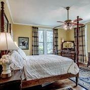208 E Livingston St, San Augustine, TX 75972 - bedroom featuring ornamental molding