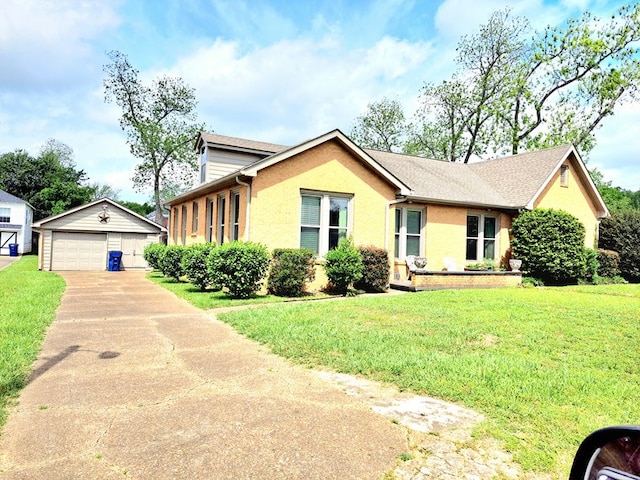 208 E Livingston St, San Augustine, TX 75972 - ranch-style home featuring an outdoor structure, a detached garage, a front lawn, and concrete driveway