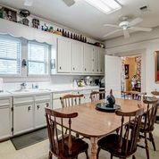 208 E Livingston St, San Augustine, TX 75972 - dining space featuring ceiling fan