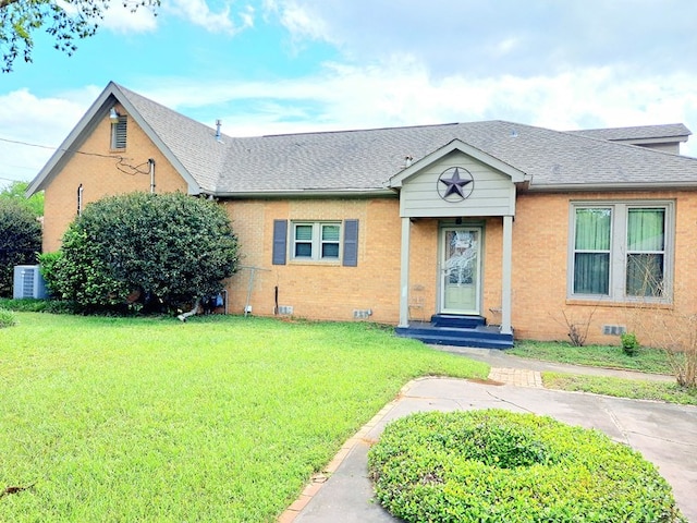 208 E Livingston St, San Augustine, TX 75972 - bungalow-style home with a front lawn, a shingled roof, central AC unit, and crawl space