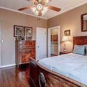 208 E Livingston St, San Augustine, TX 75972 - bedroom featuring wood finished floors and baseboards