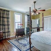 208 E Livingston St, San Augustine, TX 75972 - bedroom featuring wood finished floors