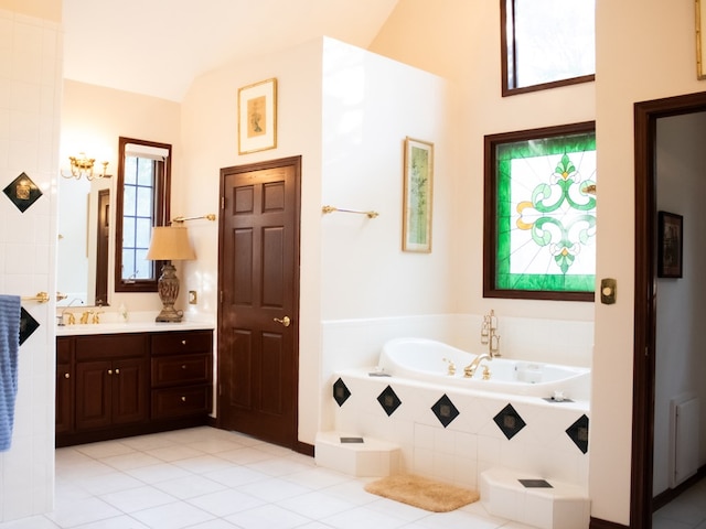 476 Jefferson Ave, Lufkin, TX 75904 - bathroom with a garden tub, vanity, tile patterned floors, and vaulted ceiling