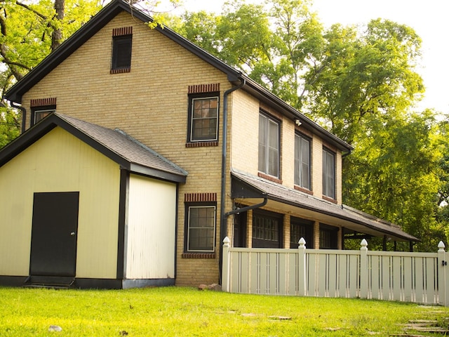 476 Jefferson Ave, Lufkin, TX 75904 - rear view of house with brick siding
