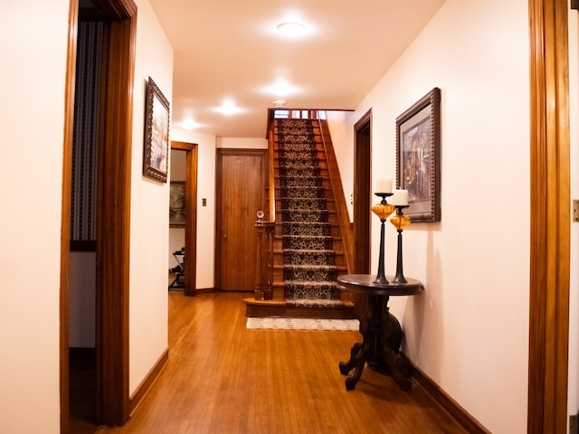 476 Jefferson Ave, Lufkin, TX 75904 - hallway with wood finished floors, baseboards, and stairs