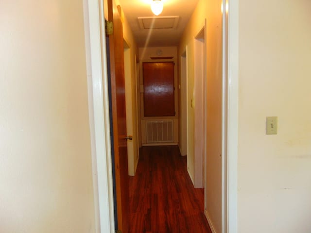 1202 Mimosa, Lufkin, TX 75901 - corridor featuring dark wood-style floors and attic access