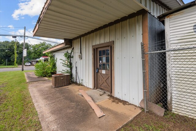 1316 N Raguet, Lufkin, TX 75904 - doorway to property with board and batten siding