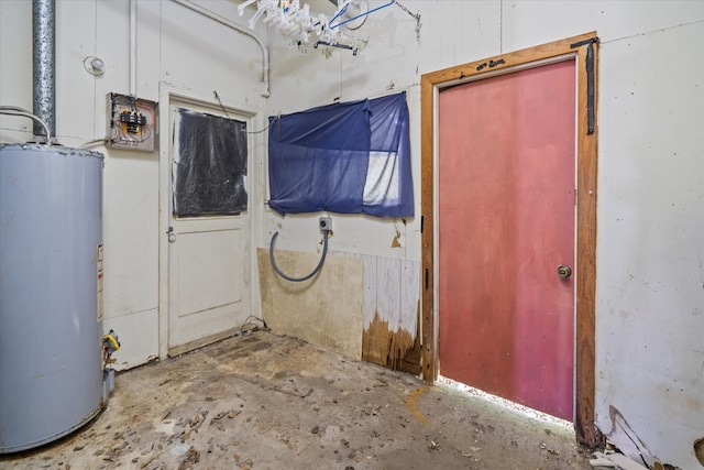 1316 N Raguet, Lufkin, TX 75904 - foyer entrance with water heater and concrete floors