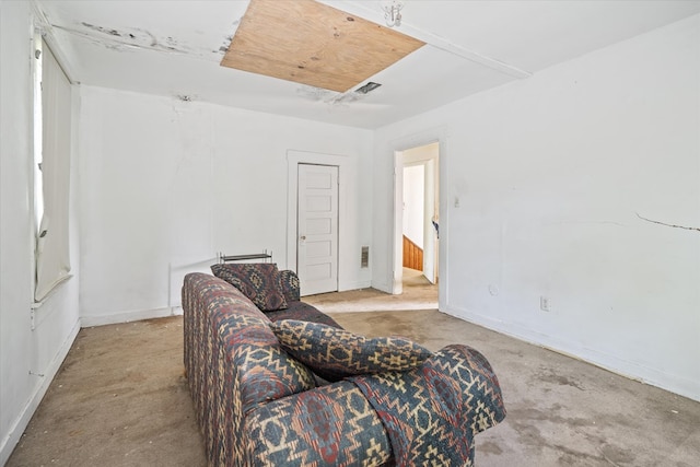 1316 N Raguet, Lufkin, TX 75904 - living area with baseboards and unfinished concrete floors